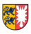 Wappen des Landes Schleswig-Holstein mit geteiltem Schild: links zwei blaue Löwen auf goldenem Grund, rechts weißes Nesselblatt auf rotem Grund.